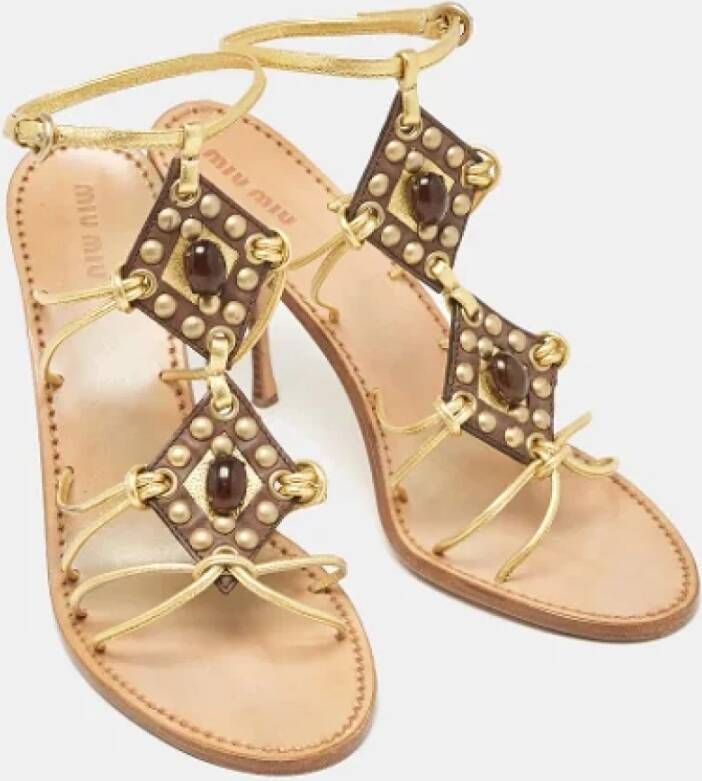 Miu Pre-owned Leather sandals Yellow Dames