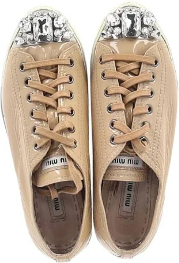 Miu Pre-owned Leather sneakers Beige Dames