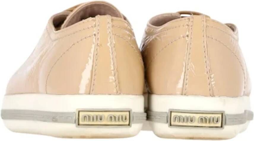 Miu Pre-owned Leather sneakers Beige Dames