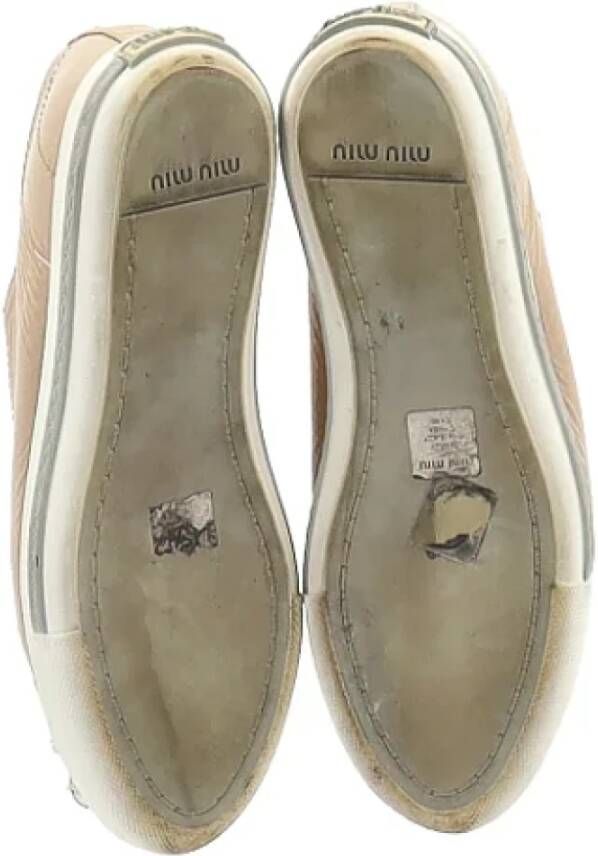 Miu Pre-owned Leather sneakers Beige Dames