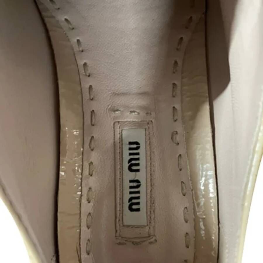 Miu Pre-owned Leather sneakers Beige Dames