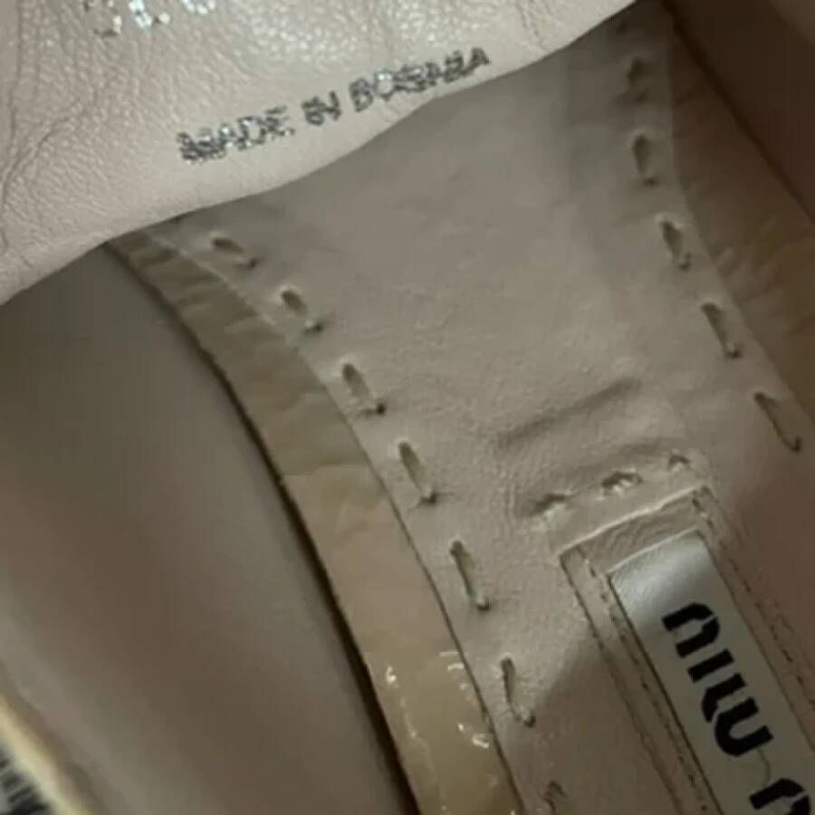 Miu Pre-owned Leather sneakers Beige Dames