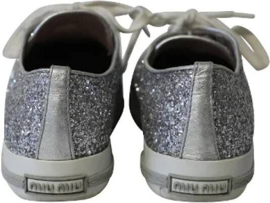 Miu Pre-owned Leather sneakers Gray Dames