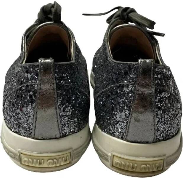 Miu Pre-owned Leather sneakers Gray Dames