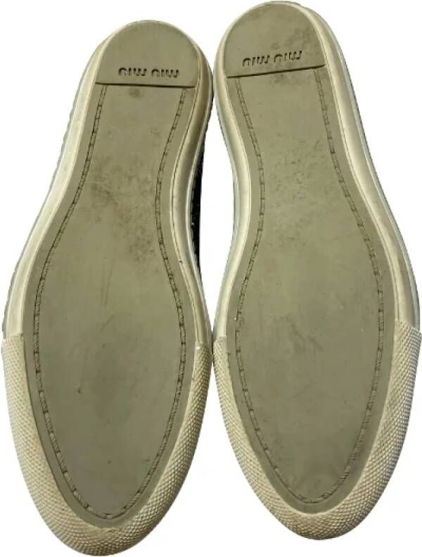 Miu Pre-owned Leather sneakers Gray Dames