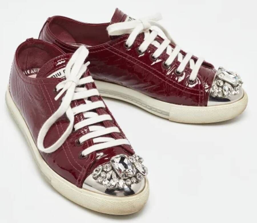 Miu Pre-owned Leather sneakers Red Dames