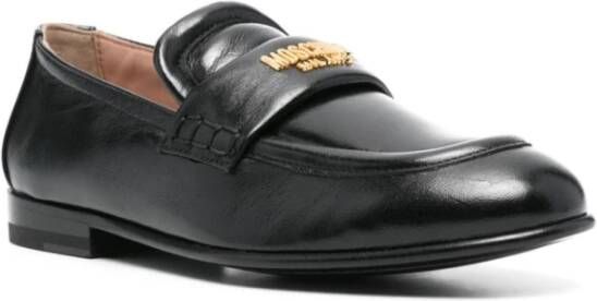 Moschino Zwarte platte schoenen met gouden details Black Dames