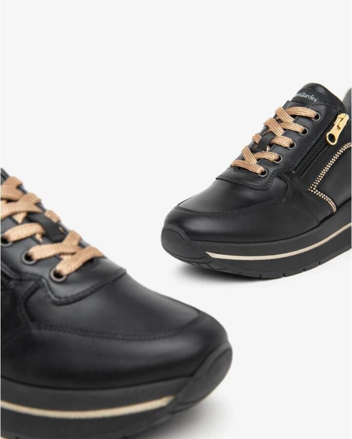 Nerogiardini Zwarte leren sneakers met zijrits Black Dames