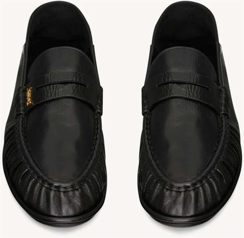 Saint Laurent Zwarte platte schoenen Cassandre goudkleurig metaal Black Heren