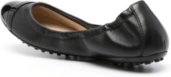 TOD'S Zwarte platte instappers Black Dames