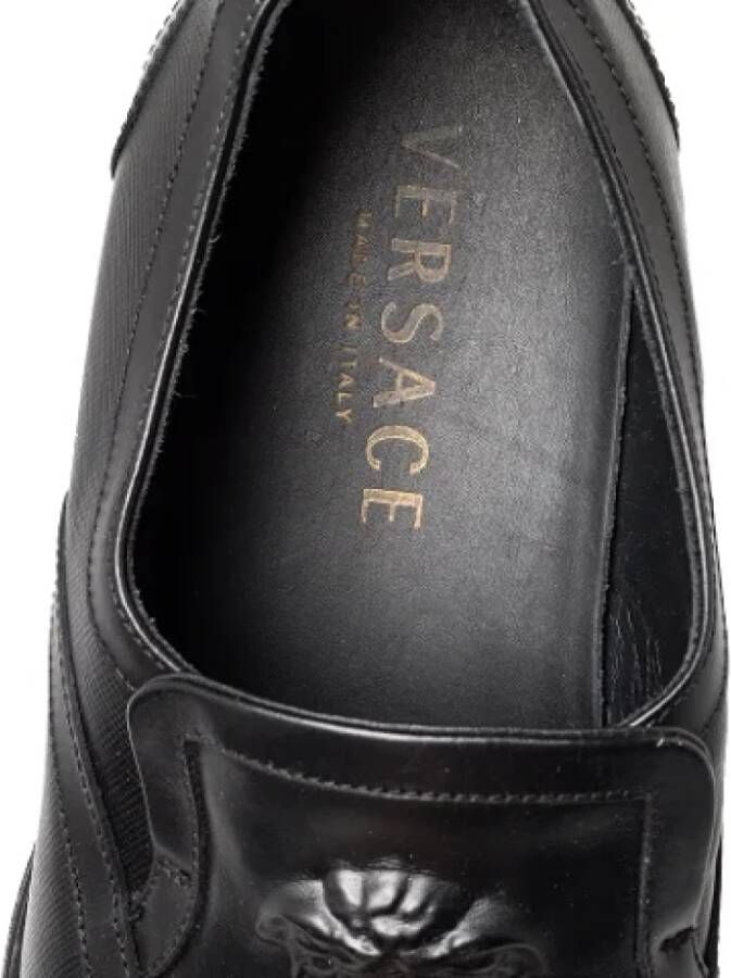 Versace Pre-owned Leather flats Black Dames