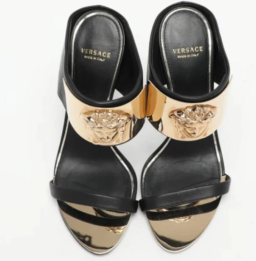 Versace Pre-owned Leather sandals Black Dames