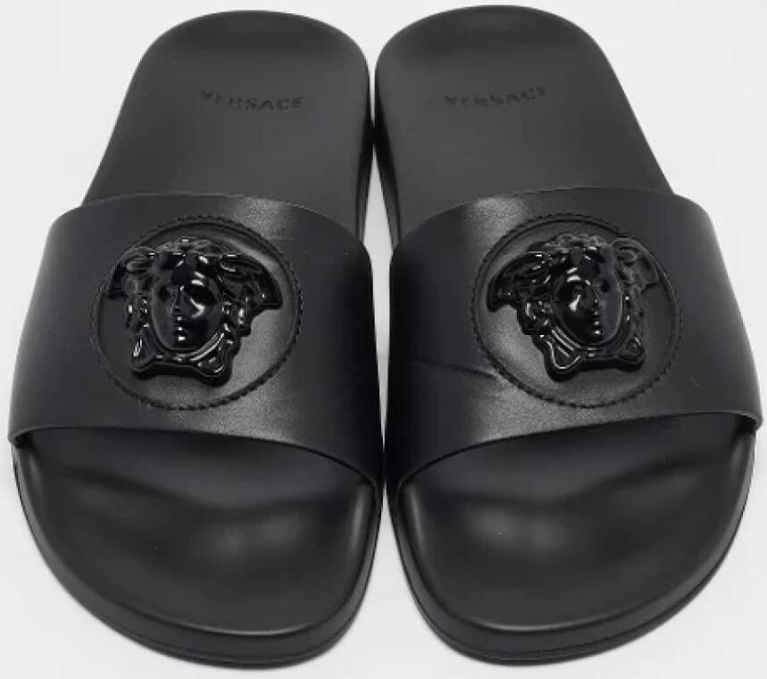 Versace Pre-owned Leather sandals Black Heren