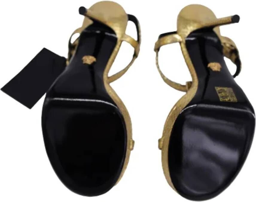 Versace Pre-owned Leather sandals Yellow Dames