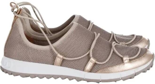 Jimmy Choo Pre-owned Fabric sneakers Beige Dames