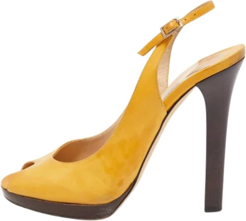 Jimmy Choo Pre-owned Leather heels Yellow Dames