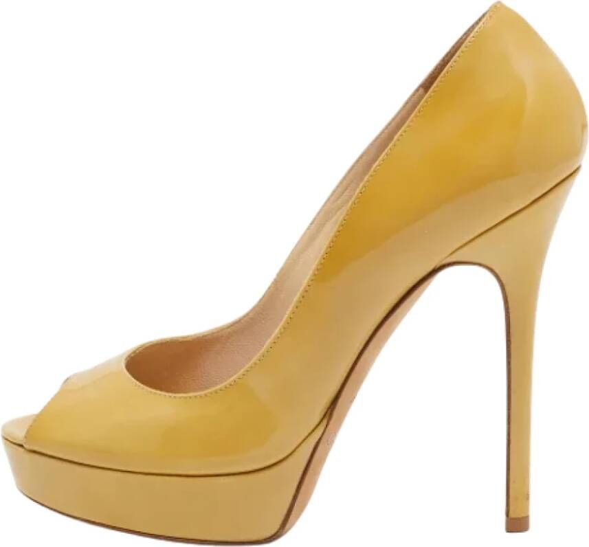 Jimmy Choo Pre-owned Leather heels Yellow Dames