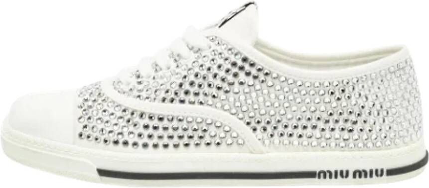 Miu Pre-owned Canvas sneakers White Dames