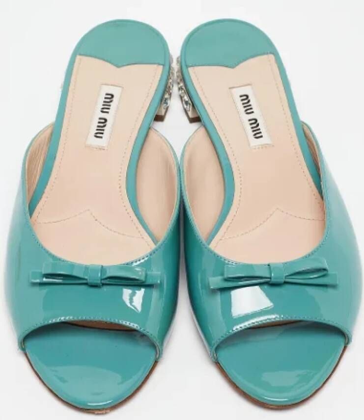 Miu Pre-owned Fabric flats Green Dames