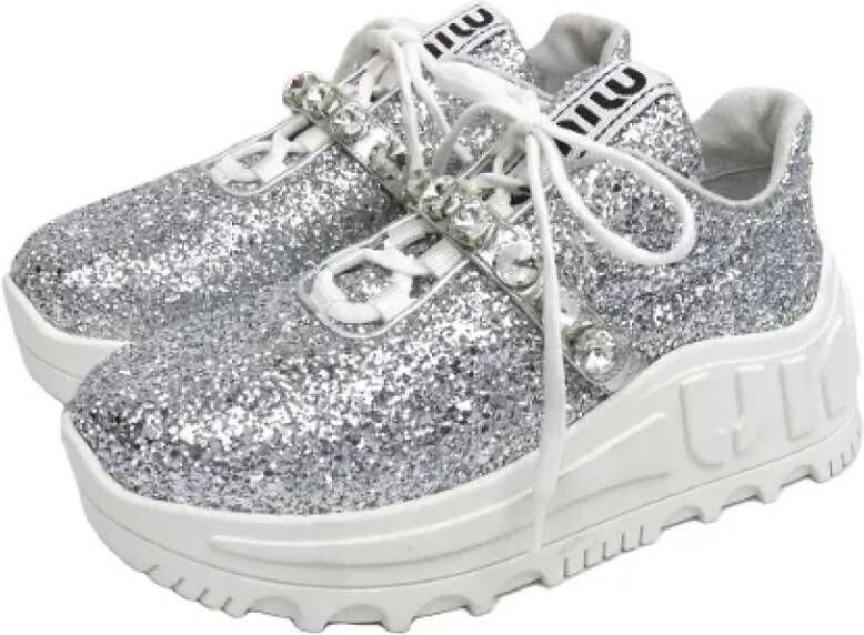 Miu Pre-owned Fabric sneakers White Dames