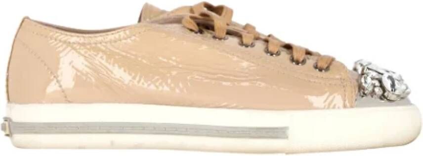 Miu Pre-owned Leather sneakers Beige Dames