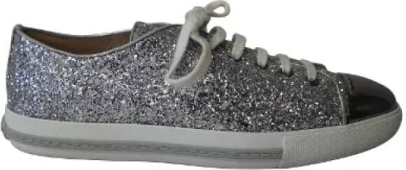 Miu Pre-owned Leather sneakers Gray Dames