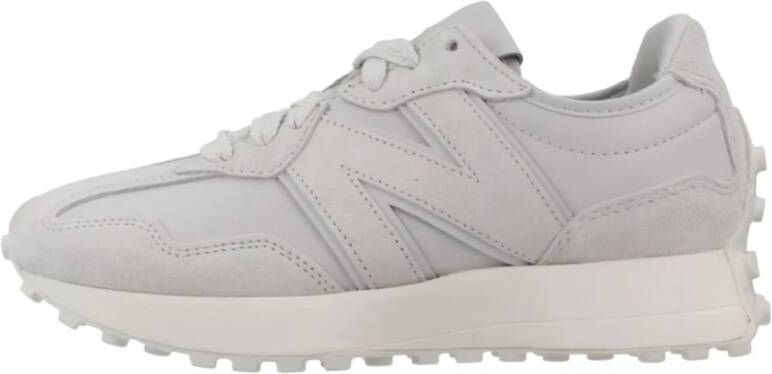 New Balance Stijlvolle Sneakers voor Mannen en Vrouwen Gray Dames