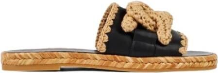 TOD'S Sliders Open-teen Leren en Raffia Muiltjes Zwart Dames