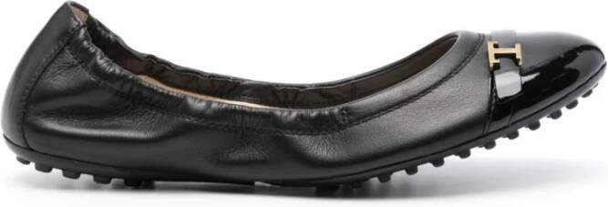 TOD'S Zwarte platte instappers Black Dames