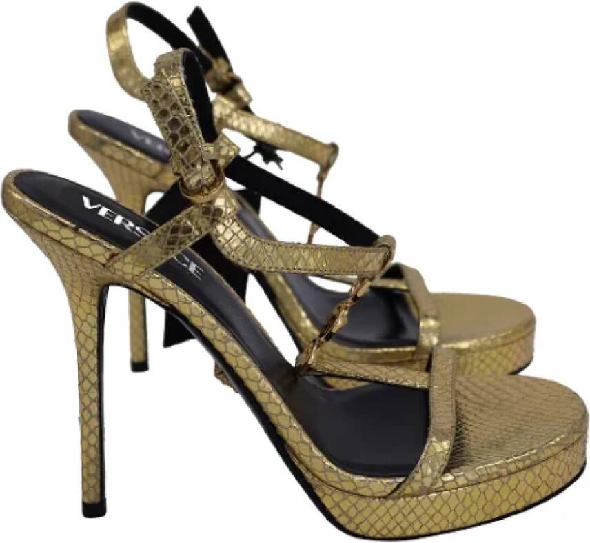 Versace Pre-owned Leather sandals Yellow Dames