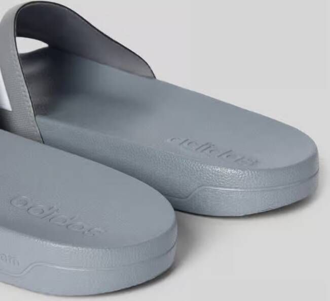 ADIDAS SPORTSWEAR Slippers met labeltypische strepen