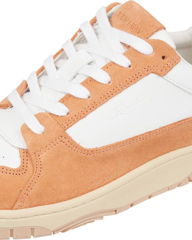 Schoenen met oranje discount label