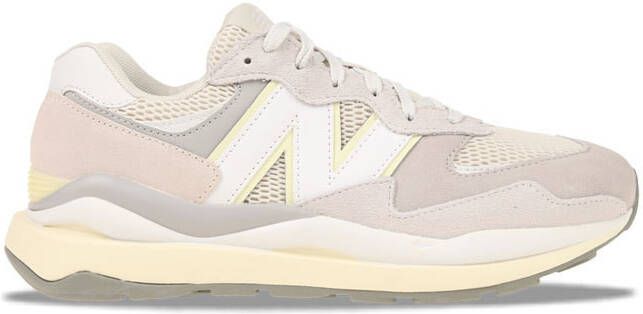 cream colored new balance shoes