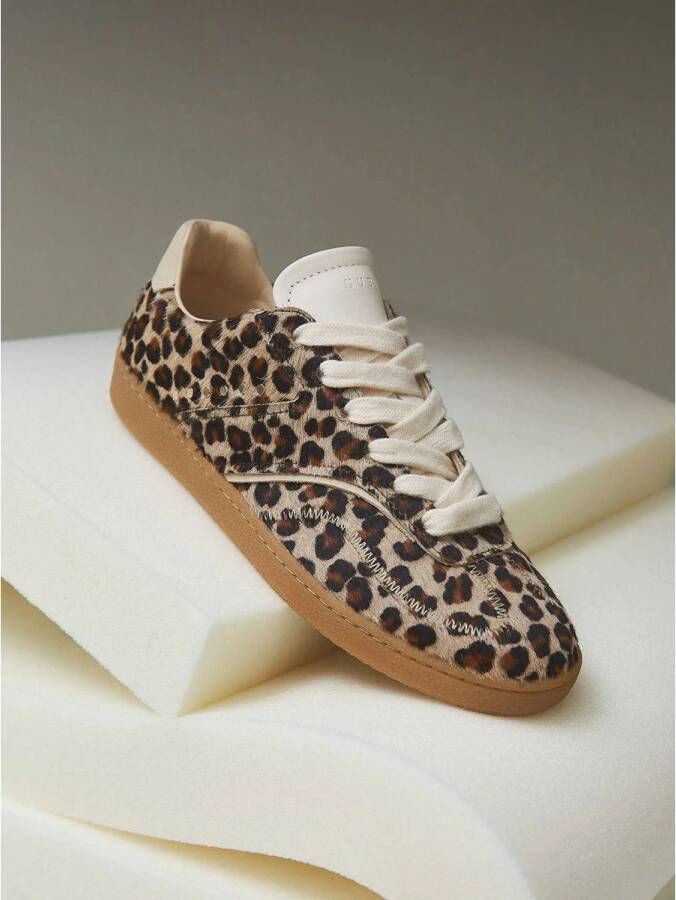 Nubikk leren sneakers met panterprint beige zwart